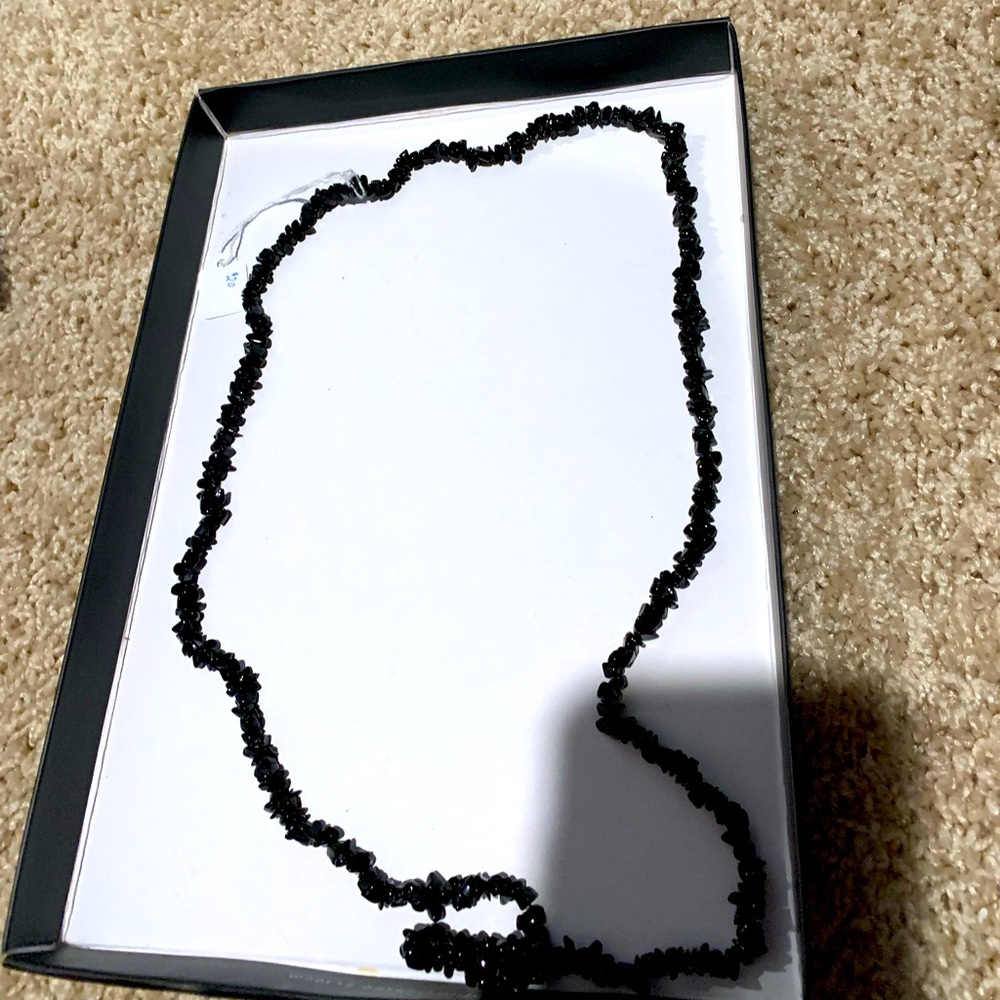 Long hematite necklace.